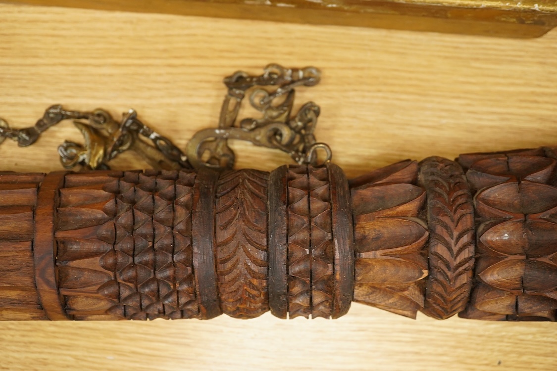 An African carved wood and cow-horn oliphant, 90cm